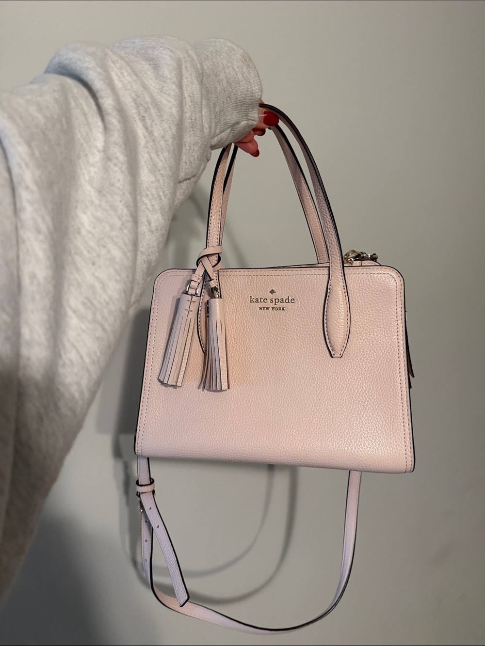 kate spade light pink leather satchel with tassels